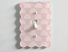 Load image into Gallery viewer, a light switch cover with a pink and white pattern
